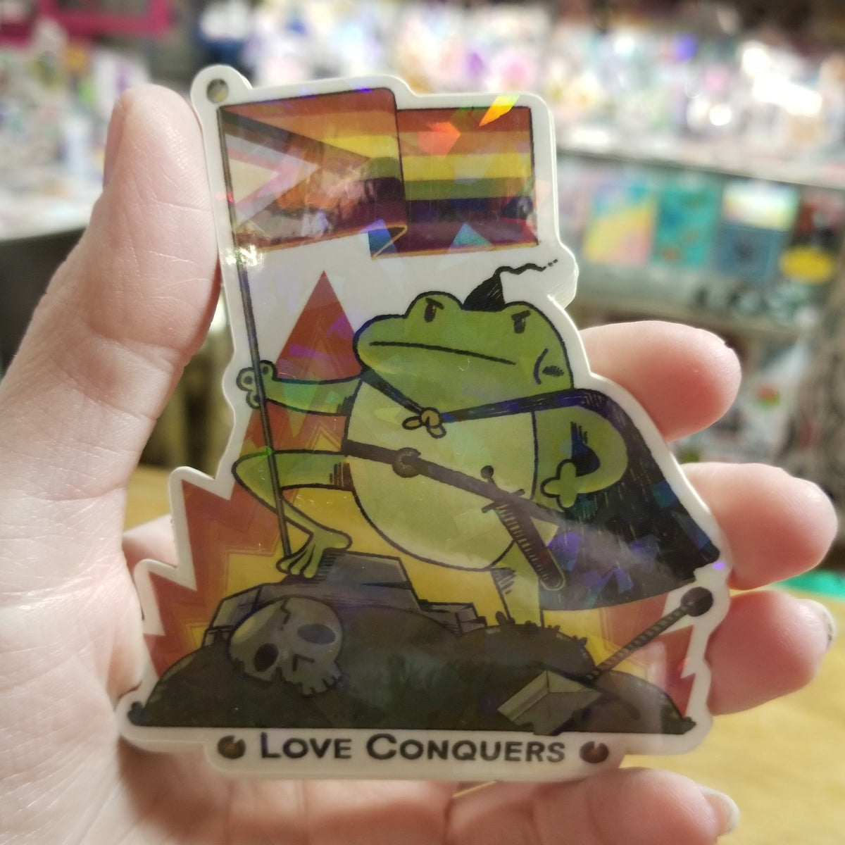 Love Conquers Pride Frog Holographic STICKER