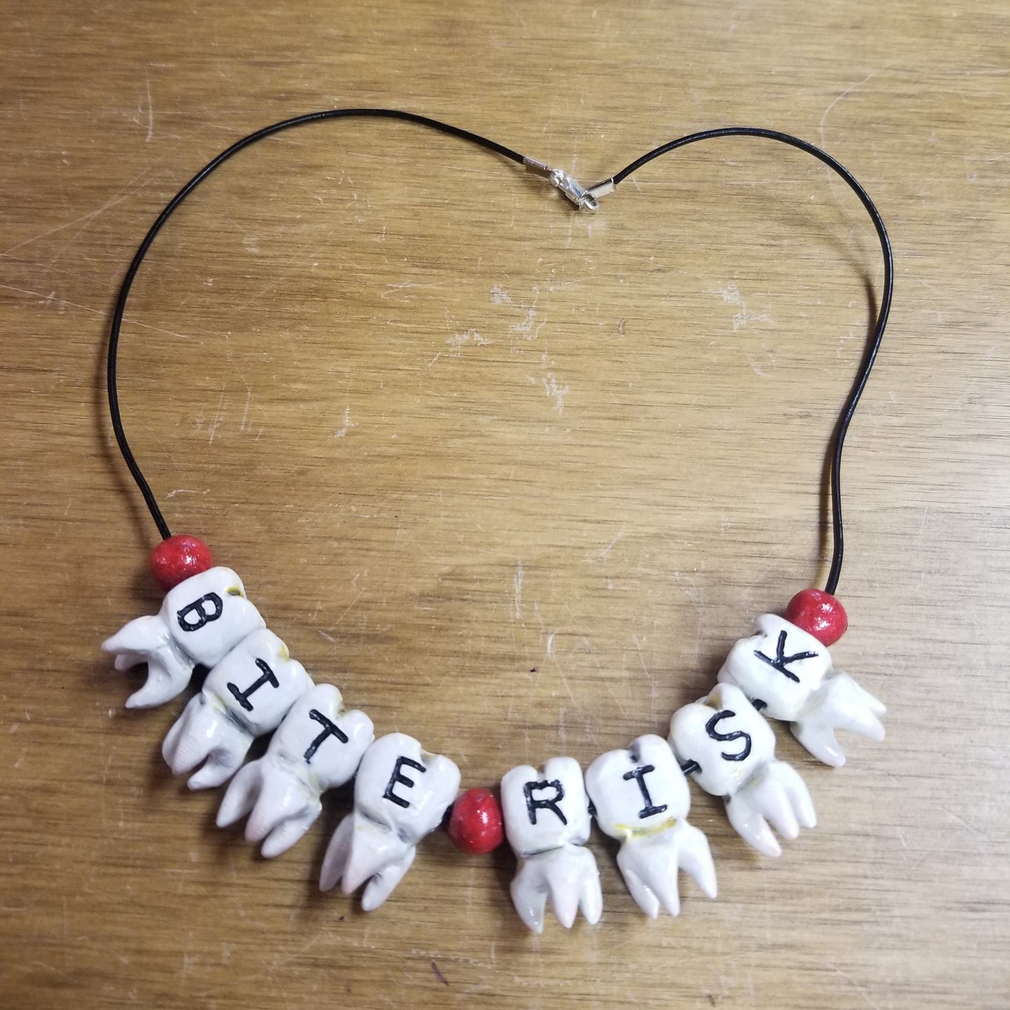 Bite Risk Tooth NECKLACE
