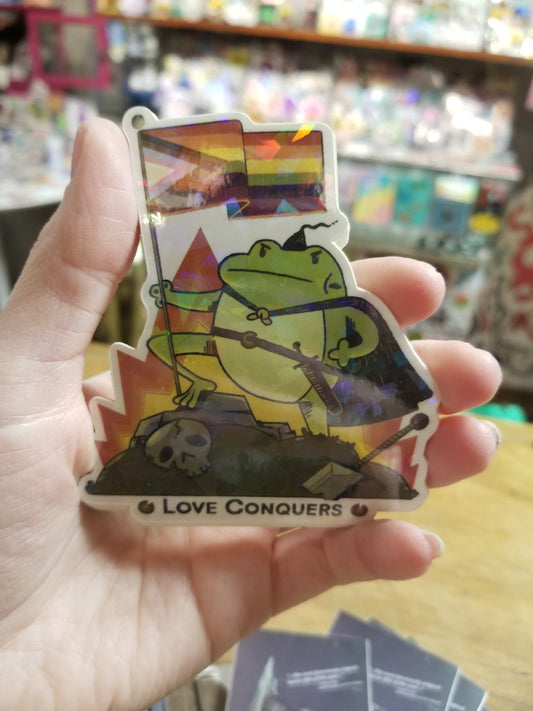 Love Conquers Pride Frog Holographic STICKER