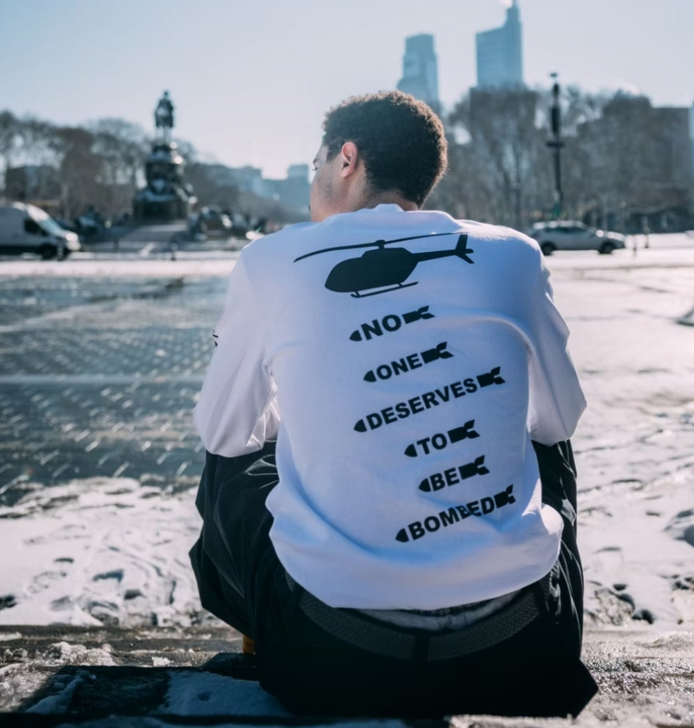 No One Deserves To Be Bombed MOVE T-SHiRT by Bombardment