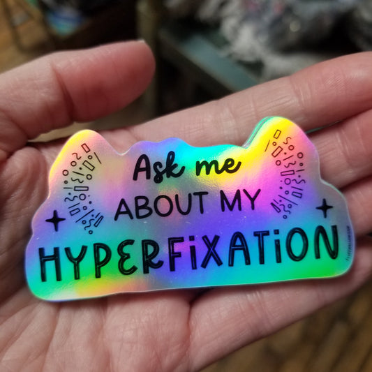 Ask me about my Hyperfixation Holographic STICKER
