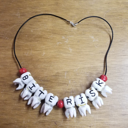 Bite Risk Tooth NECKLACE