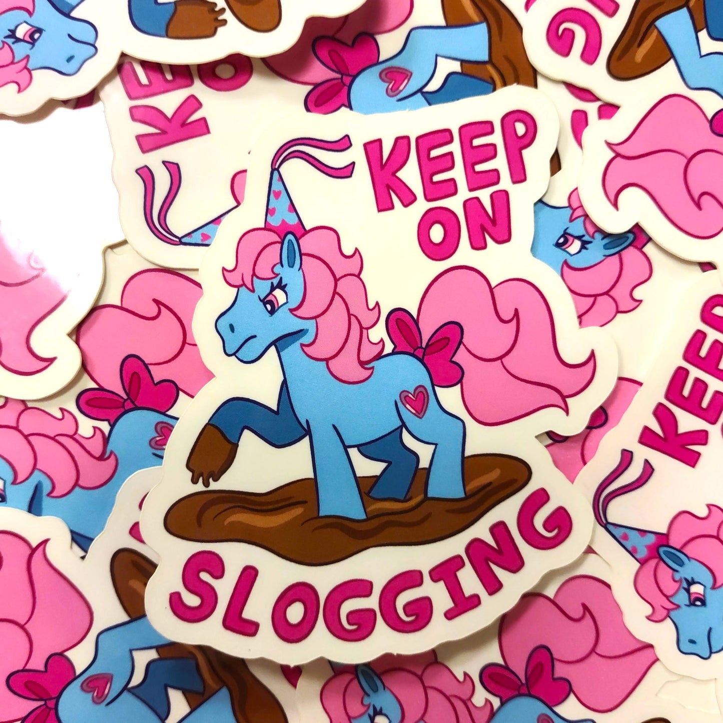 Keep On Slogging Unicorn STICKER by Millie Dubois