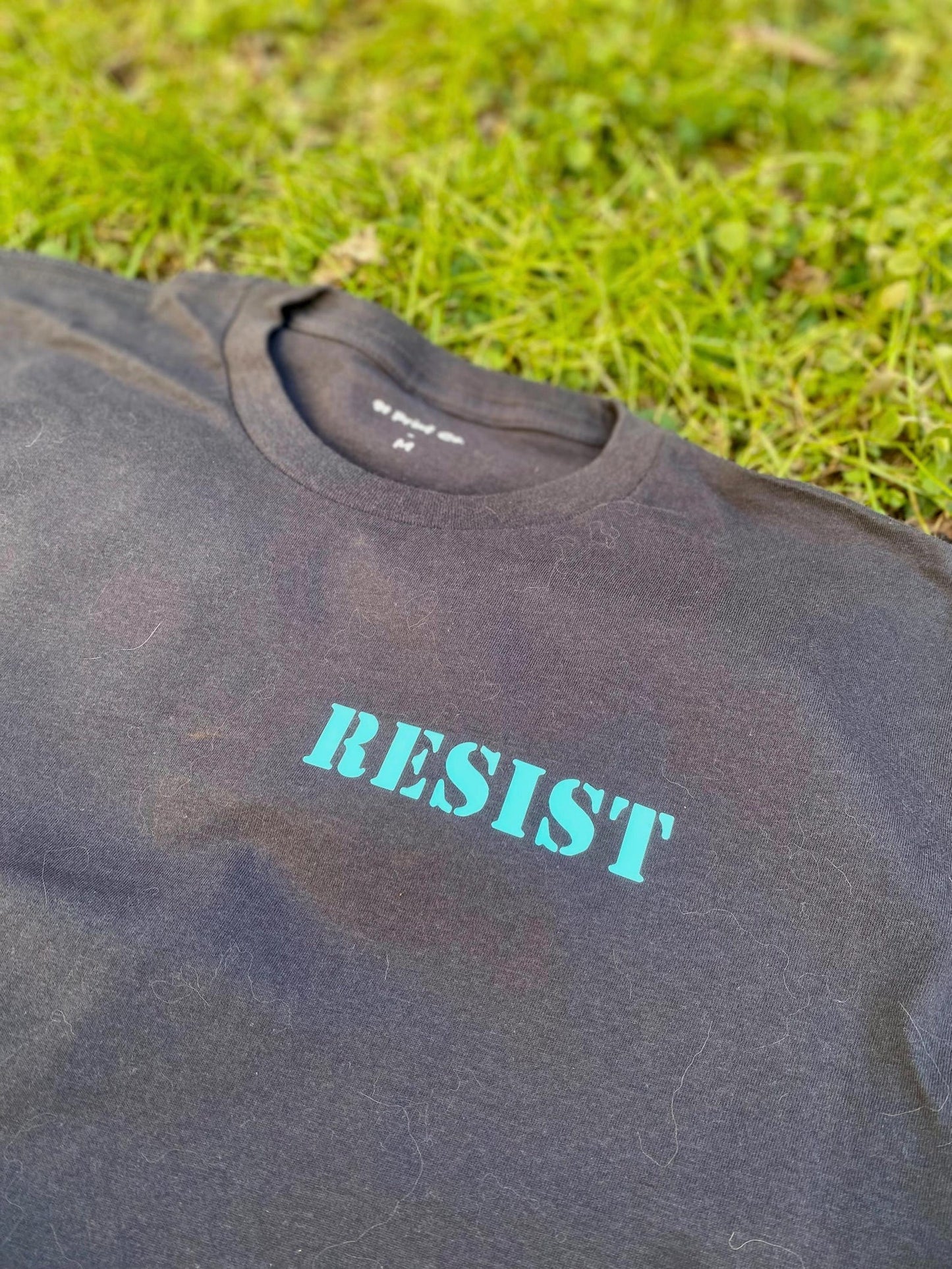 RESIST - Dark Gray Charcoal T-SHiRT with Teal Pocket Print on Left Chest