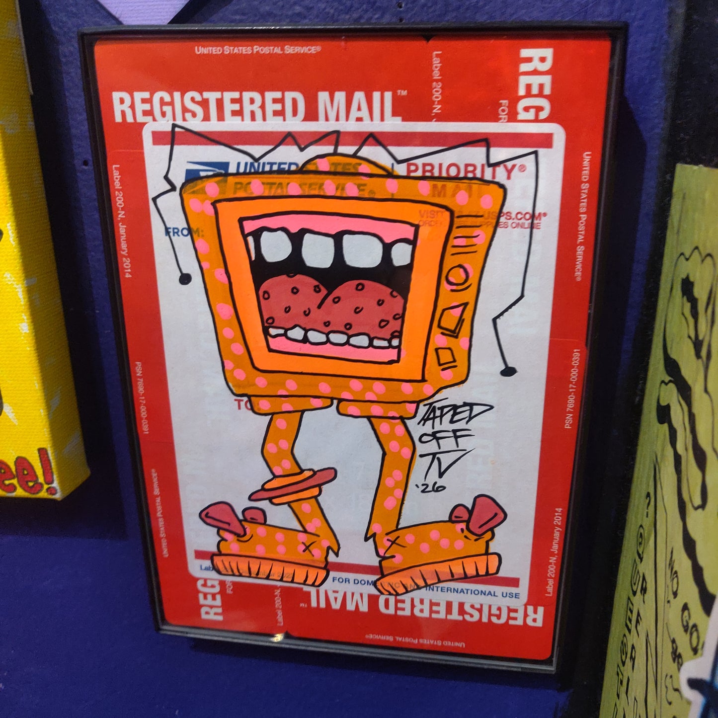 Registered Mail Neon Orange Framed TV Monster by @TapedOffTV